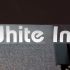 White ink on clear sticker material
